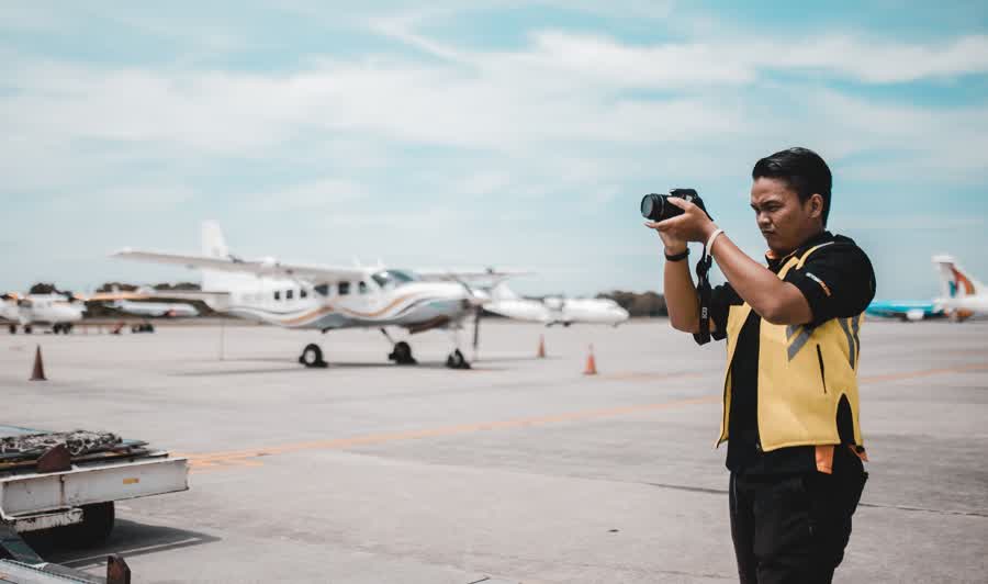 Aviation professional on the tarmac with aircraft